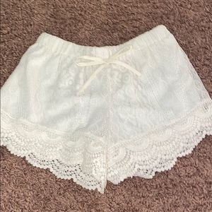 White lace shorts
